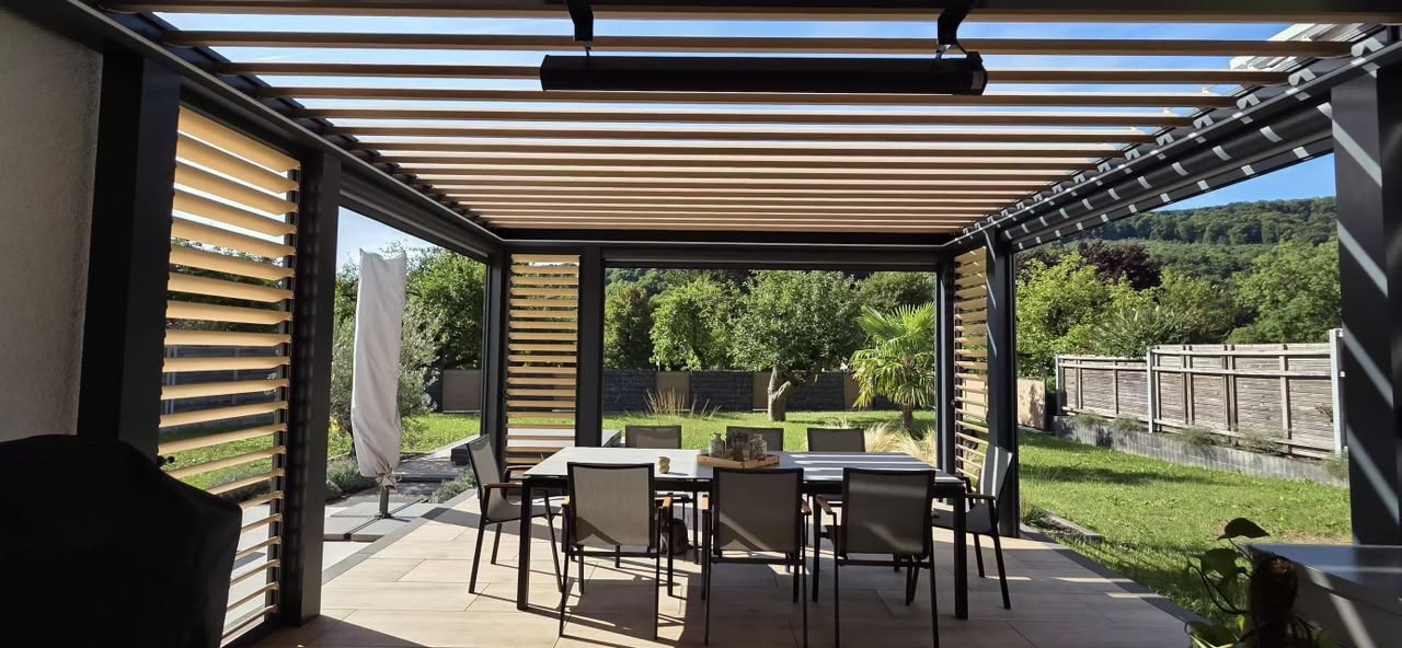 Louvered rooftop pergola with kitchen island