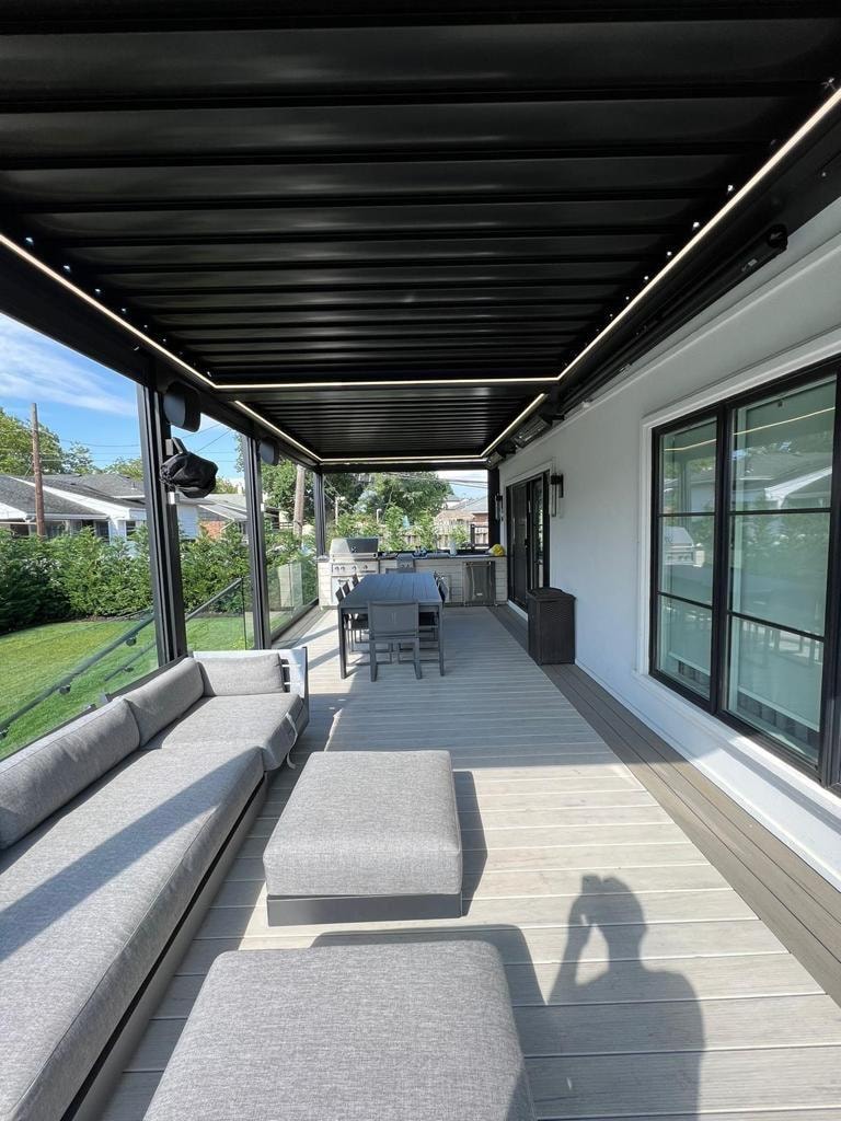 Pergola with premium patio furniture underneath